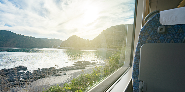 Passenger rail interior overlooking the sea